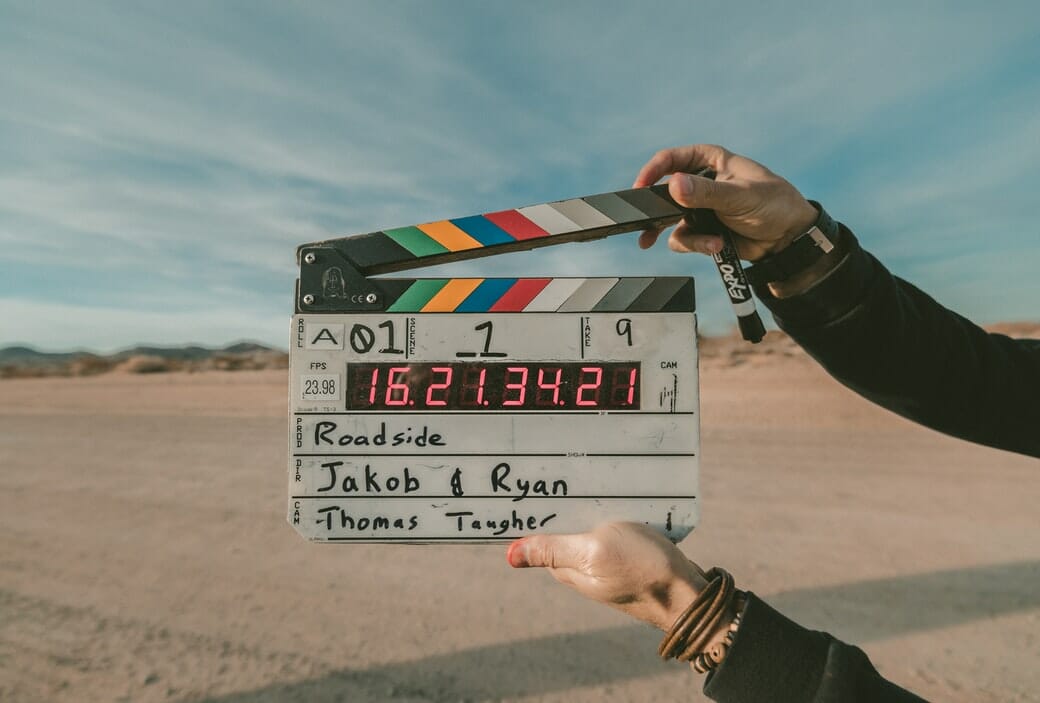 Film slate on a beach